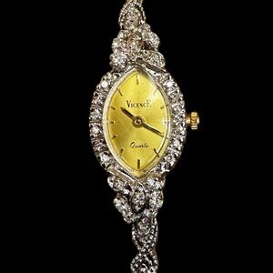 Vintage 14k gold and Diamond watch w/ safety clasp